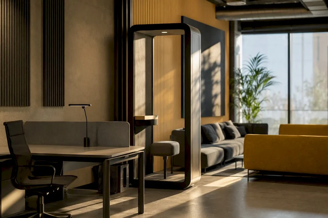 Interior modern de coworking compartimentat, cu cabină și prize de curent