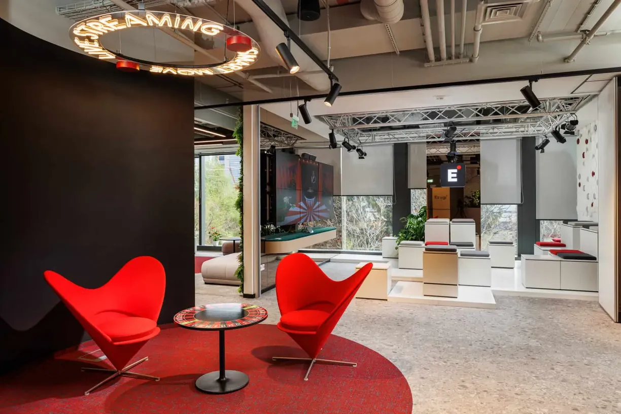 Ezugi - lounge area with red chairs