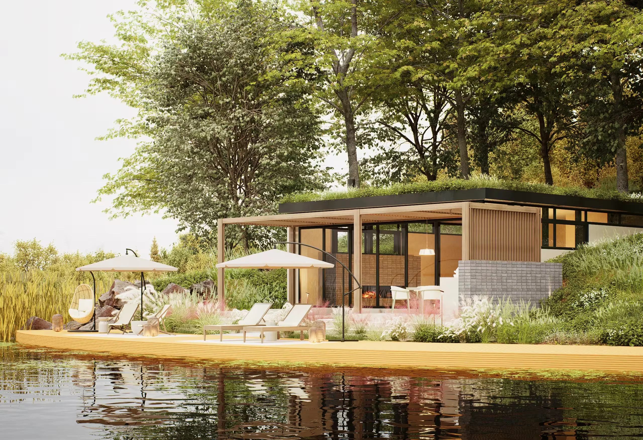 Pavilionul Verde - view from the water, with the curved deck and the lit fireplace